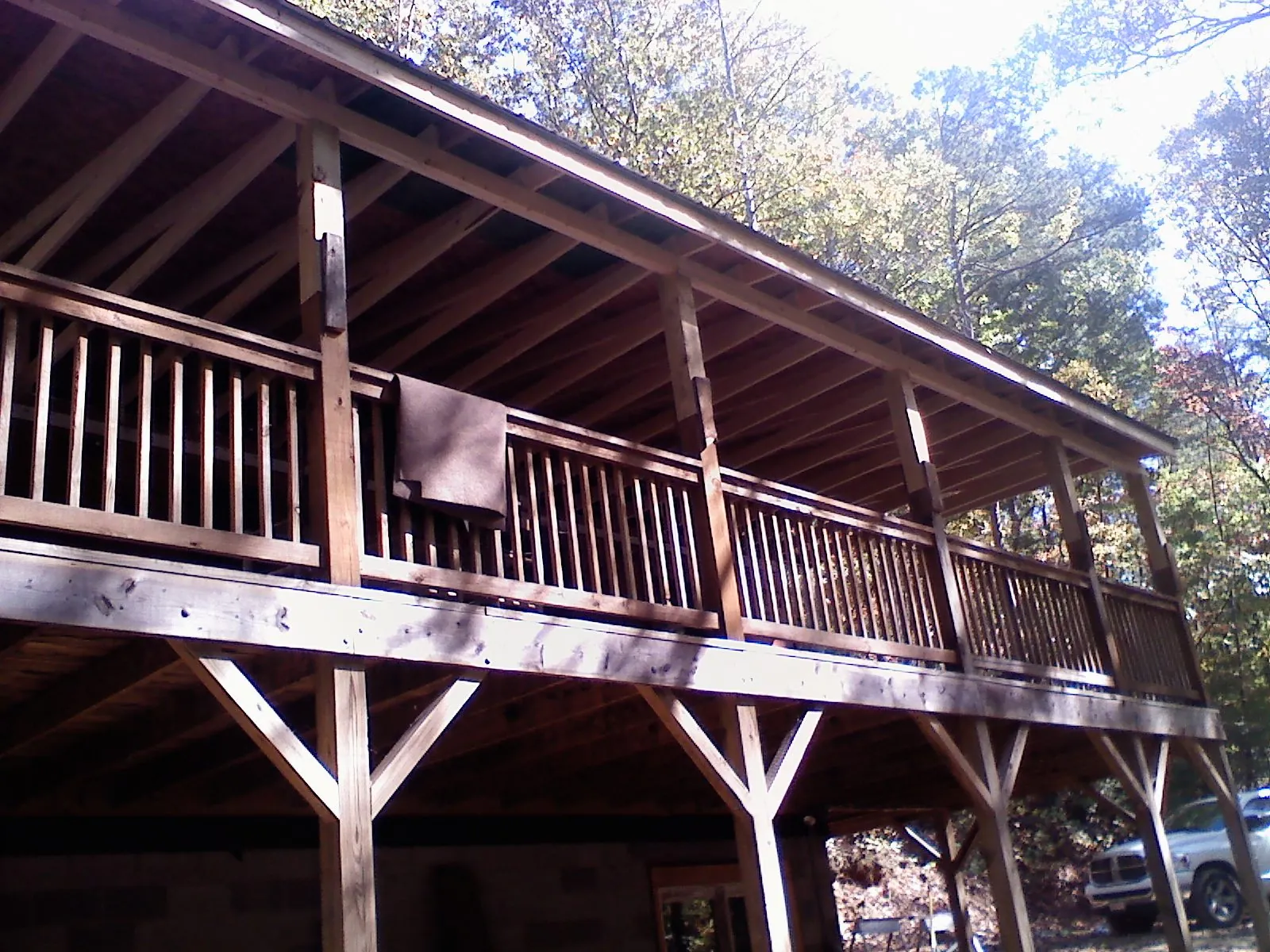 Timber framing under a new elevated porch and deck — Roof Leak Repair in Capac by Roofing Brothers
